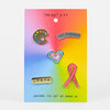 A set of five enamel pins on a rainbow gradient card, including a paint palette, a curved "NOT STRAIGHT" pin, a layered heart, an L.G.B.T.Q. bar, and a pink ribbon pin with the words "FOR EVER."
