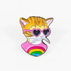 A colorful enamel pin shaped like a cat head wearing pink heart-shaped sunglasses, with orange and yellow fur and a pink shirt featuring a rainbow arc.