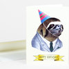 A folded greeting card featuring an illustrated sloth wearing a colorful party hat and a striped suit, with a yellow banner that says "HAPPY BIRTHDAY!"