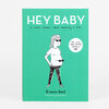 A green book cover titled "HEY BABY" with the subtitle "A comic memoir about becoming a mom," featuring a simple black-and-white drawing of a pregnant woman and a white speech bubble reading "Now with 100% more baby!".