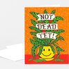 A colorful greeting card with a smiling yellow plant pot and green leaves, featuring the text "NOT DEAD YET!" in three banner panels.