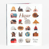 A hardcover book titled "Hogar" with the author name "Carson Ellis," featuring small illustrated houses, shelters, and other home-like structures arranged across the cover.