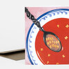 A folded greeting card shows a spoon illustration over a red bowl with the words "FEEL BETTER SOON" inside the spoon and scattered letters around it.