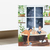 An illustrated greeting card shows two men relaxing in a clawfoot bathtub surrounded by potted plants, with a night sky visible through a window and the words "NEVER MORE" on one bather's top.