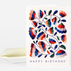 A folded greeting card with an abstract floral vine design in blue, red, orange, green, and gray, and the words "HAPPY BIRTHDAY" printed at the bottom.
