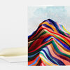 A folded greeting card with a colorful layered mountain illustration and the text "YOU ARE THE BEST" across the top, shown with a plain envelope.