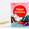 A greeting card with a large red sun shape and the words "Happy birthday" over a colorful abstract landscape illustration.