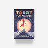 A tarot card deck box with the text "TAROT FOR ALL AGES" and "EMBARK ON THE GREAT TAROT ADVENTURE," featuring an illustrated figure walking on a mountain under a large glowing moon.