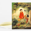 A folded greeting card featuring an illustration of a child in a red coat standing in a forest with several animals, including a fox, rabbits, birds, and small squirrels.