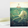 A folded greeting card featuring an illustration of a child in a striped flotation ring above a large octopus underwater.