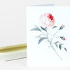 A folded greeting card featuring a watercolor-style pink rose stem with leaves and two buds on the front.