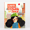A hardcover book cover titled "CAROL AND THE Pickle Toad" by Esmé Shapiro, featuring a girl with large red glasses and a green toad on her head in front of colorful buildings.