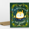 A folded greeting card with a fox illustration and the text “OH MY CRICKETS! HAPPY BIRTHDAY!” in white lettering.