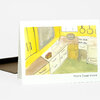 A folded greeting card with a watercolor-style illustration of a yellow kitchen and the text "Home Sweet home" on the front.