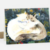 A folded greeting card featuring two curled-up cats surrounded by a dark floral border, with the text "I LIKE YOU." on the front.