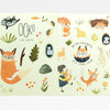 An open sticker set with illustrated animal and nature stickers, including foxes, birds, leaves, mushrooms, and readable text that says “OOko,” “Esmé Shapiro,” and “OH MY CRICKETS! LET'S PLAY STICK!”