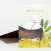 A folded greeting card reads "SORRY I'M SO STINKY." and shows a white dog-like character with flies, a red leash, mushrooms, and green plants.