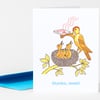 A folded greeting card with an illustration of a bird delivering a pizza to chicks in a nest and the text "thanks, mom!" on the front.
