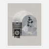 A monochrome art print with layered geometric shapes, a leafy stem, a flower, and a small cursive artist signature in the lower right corner.