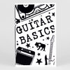 A black-and-white zine or booklet cover titled "GUITAR BASICS" with bold letters and graphic illustrations of guitars, an amplifier, stars, and a cat.