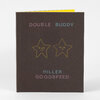 A dark brown book with the title "DOUBLE BUDDY" at the top, two simple star faces in the center, and "HILLER GOODSPEED" near the bottom, with a yellow page edge visible at the top.