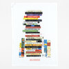 A white tea towel printed with an illustrated stack of colorful cookbook and food-writing book spines, with the text "IDEAL BOOKSHELF" near the bottom and "Food Writing" and "Jane Mount" below the design.