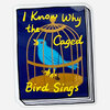 A rectangular sticker with rounded corners shows a blue bird inside a gold birdcage and the yellow text "I Know Why the Caged Bird Sings."