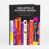 A black hardcover journal titled "BIBLIOPHILE DIVERSE SPINES READER'S JOURNAL" with a row of colorful book-spine illustrations and author names across the front.