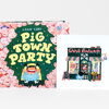 An illustrated book or card set titled "LIAN CHO PIG TOWN PARTY" with a green cover framed by pink pigs and a smaller matching print showing a bakery storefront labeled "Oink Bakerys."