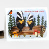 A greeting card with a watercolor illustration of two badgers holding slices of cheese and the text "HAPPY FATHER'S DAY!".