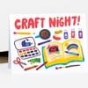 A folded card with the words "CRAFT NIGHT!" in red lettering and colorful illustrations of art supplies, a paint palette, scissors, a pencil, markers, a paintbrush, and an open book.
