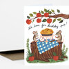 A folded greeting card shows two mice around a birthday pie on a tree-stump table with apples and the text "it's time for birthday pie!".