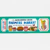 A colorful bookmark with the text "The BLACKBERRY CREEK FARMERS MARKET" and "ADMIT ONE," decorated with illustrated honey, strawberries, a pie, jam, flowers, and a produce basket.
