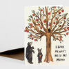 A folded greeting card with a watercolor-style illustration of a mother bear and cub under an apple tree, with the text "I WILL ALWAYS NEED MY MAMA" on the front.