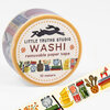 A roll of washi tape labeled “LITTLE TRUTHS STUDIO,” “WASHI,” “removable paper tape,” and “10 meters,” decorated with small kitchen-themed illustrations around the edge.