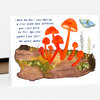 A greeting card with hand-lettered text and an illustration of bright orange mushrooms growing from a log, with a blue butterfly and small plants.