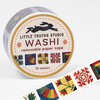 A roll of washi tape labeled "LITTLE TRUTHS STUDIO WASHI removable paper tape 10 meters" with quilt-block style patterned tape visible on the roll and unrolled strip.