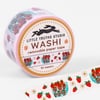 A roll of pink washi tape printed with strawberries in turquoise baskets and small white flowers, with the label reading "LITTLE TRUTHS STUDIO WASHI removable paper tape 10 meters."