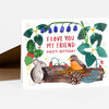 A folded greeting card with an illustration of a mouse and a bird on a log surrounded by flowers, berries, and leaves, with the text "I LOVE YOU MY FRIEND" and "HAPPY BIRTHDAY" on the front.