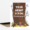 A greeting card shows a large tree trunk with the text "YOUR HEART IS SO BIG ( I love that about you. )" and a small figure at the base with arms outstretched.