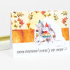 A folded birthday notecard with watercolor-style mice wearing party hats around a cake, autumn leaves, and the text "HAPPY BIRTHDAY! WHERE'S THE PARTY?" on the front.