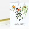 A folded greeting notecard shows hanging watercolor-style plants and hearts with the text "HANG IN THERE!" on the front.