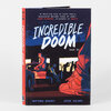 A hardcover book titled “INCREDIBLE DOOM [vol 2]” with the authors’ names Matthew Bogart and Jesse Holden on the cover and spine.