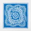 A square blue and light blue bandana with a central stylized flower and butterfly-like insect motif surrounded by a decorative border pattern.