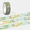 A roll of decorative washi tape with a repeating pattern of white geese on green and blue geometric blocks.