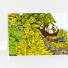 A folded greeting card featuring a colorful forest forage illustration with green leaves, mushrooms, and a basket of fungi.