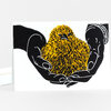 A greeting card with a stylized yellow chick cradled in two black hands.