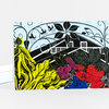 A folded greeting card with a colorful botanical illustration of a farmhouse, flowers, and berries, with the text "local tastes best" printed on the front.