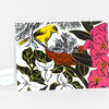 A folded greeting card featuring a colorful botanical illustration with a yellow bird, nest, black-and-white birds, pink flowers, and dark leaves on a white card.