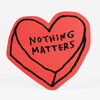 A red heart-shaped sticker with a black hand-drawn outline and the words "NOTHING MATTERS" in black uppercase letters across the center.